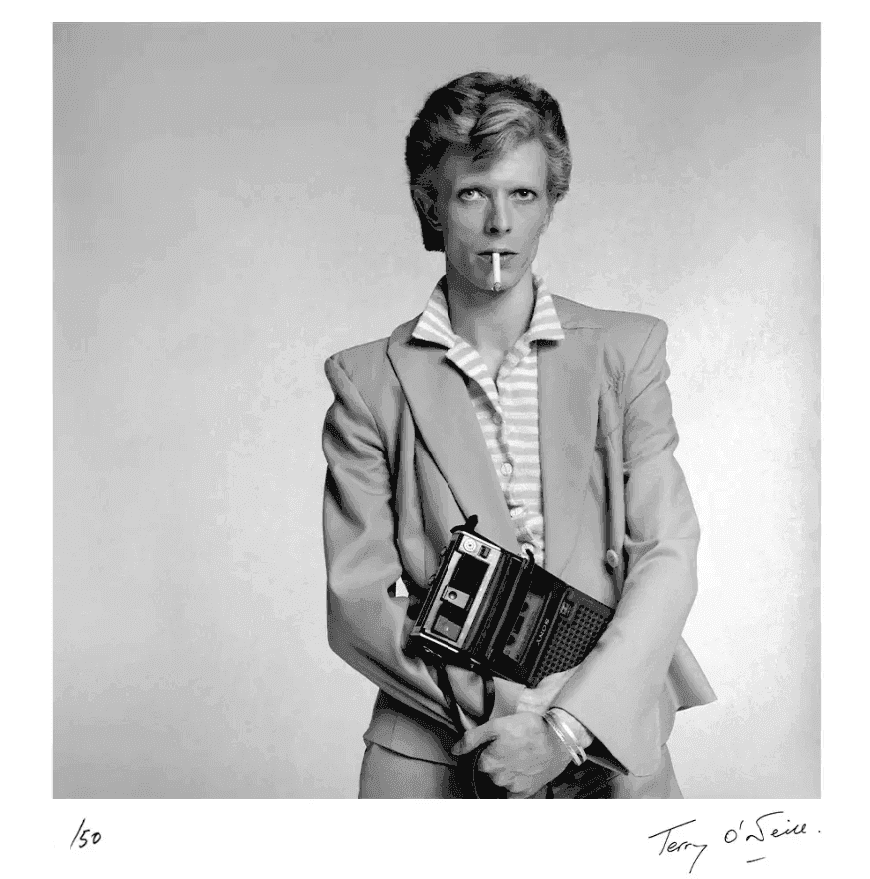 Terry O'Neill, ‘David Bowie holding a Cassette Player’, 1974, Print, Posthumous Edition: Gelatin Silver Print, null,