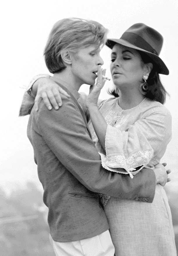 Terry O'Neill, ‘David Bowie with Elizabeth Taylor (Lifetime Signed)’, 1975, Print, Silver Gelatin Print, null, Numbered