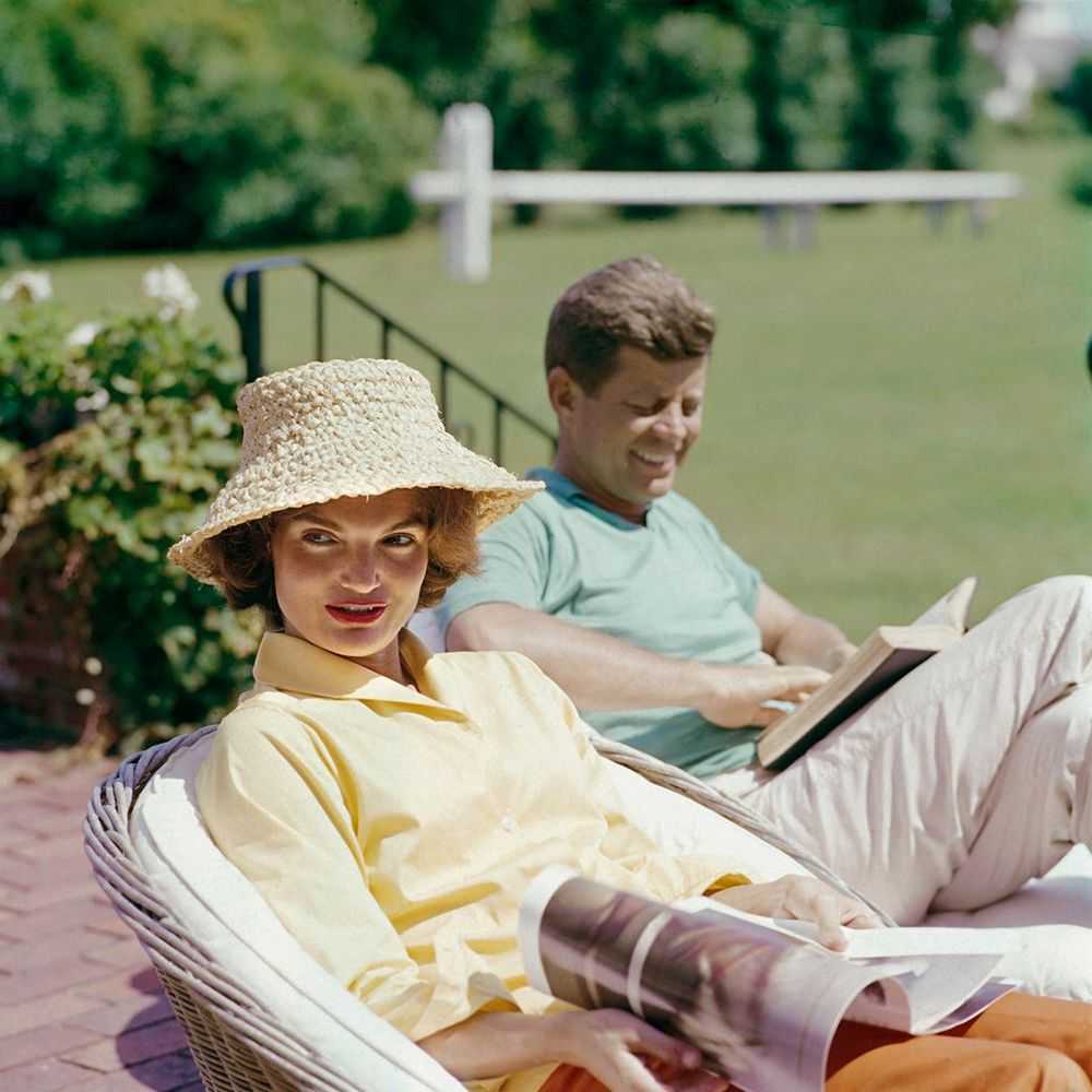 Mark Shaw, ‘Kennedys, Jackie in Straw Hat, JFK Reading, 1959’, 1959, Print, Pigment print on Hahnemϋhle photo rag paper, null,