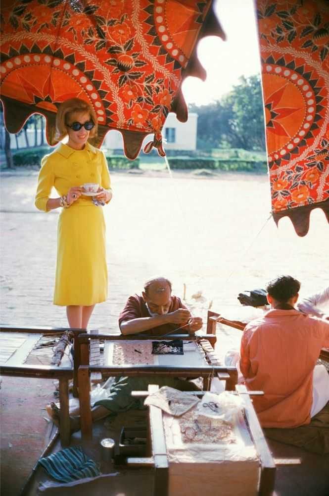 Mark Shaw, ‘Tiger Morse in Yellow Suit Watches Sewing’, 1962, Print, Pigment print on Hahnemϋhle photo rag paper, null,
